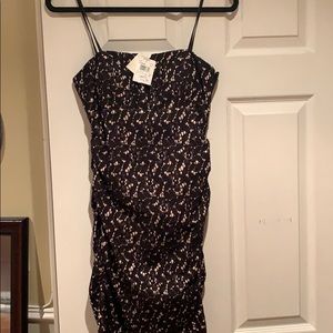 Tan and black strapless dress